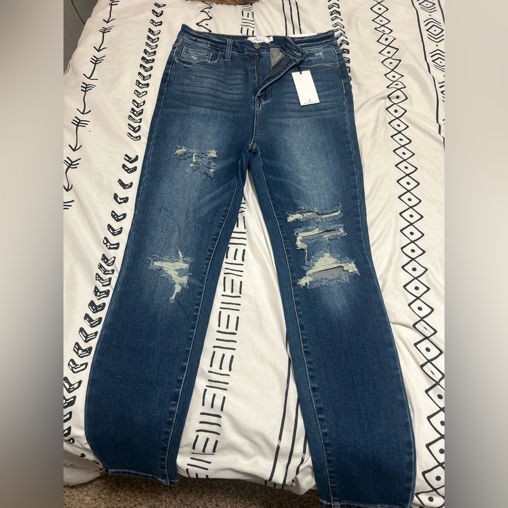 Distressed Blue Jeans Women’s Denim